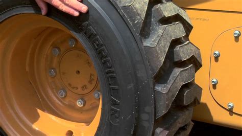 how to change flat tire on a skid steer|flat tire on skid steer loader.